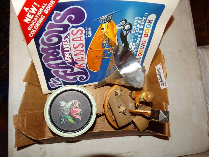 lot 208 image: Flat of, music box from Switzerland thorens, painted can, funnel, coloring book.