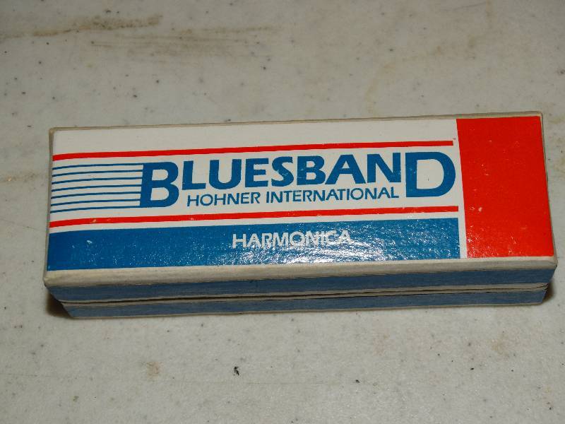lot 219 image: Blues Band Hohner International Harmonica.