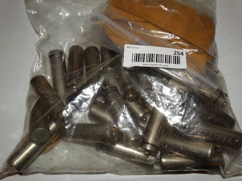 lot 254 image: Vintage Be Thrifty metal penny holders.