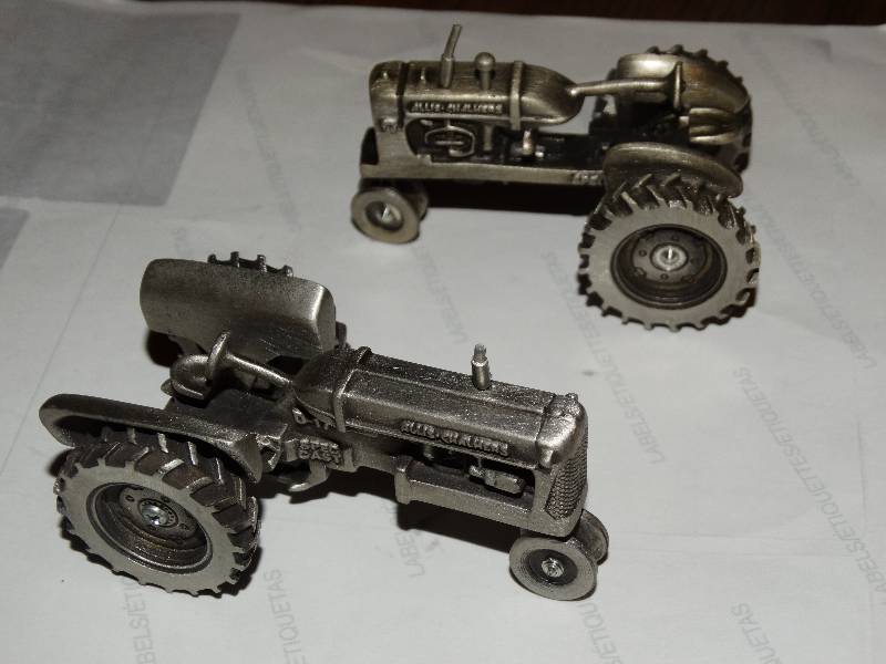 lot 270 image: 2- Small Pewter Allis- Chalmers.