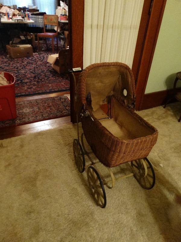 lot 277 image: Antique wicker baby doll carriage 93 year old.