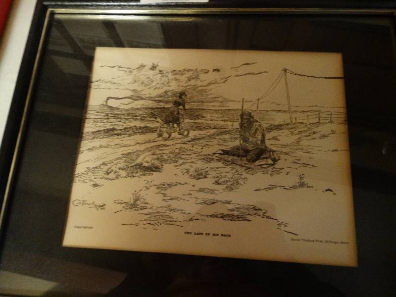 lot 313 image: Framed art by C Russel the last of his race.