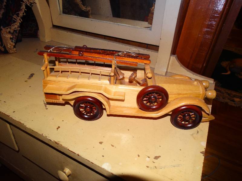 lot 330 image: Musical wooden firetruck.