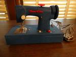 Mini Vintage sew etta sewing machine with foot pedal.