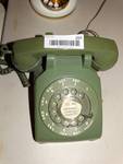 Vintage green rotary phone.