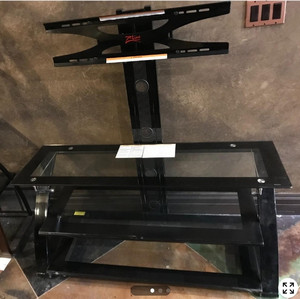 lot 670 image: 3-In-1 TV stand with Integrated Mount Retail $125.99