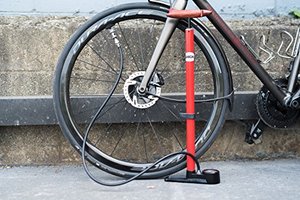 lot 40056 image: SILCA Pista Floor Pump Red with Black Single Sided Base and SILCA Presta Chuck and Threaded Schrader Chuck