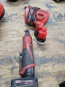 lot 43091 image: Milwaukee Cordless Ratchet, Charger And Batterys
