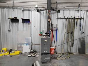 lot 43049 image: Contents Of Wall W Including Filing Cabinet, Rods and More