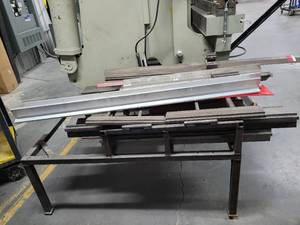 lot 47512 image: Metal Fabricated Table W Assorted Brake Parts