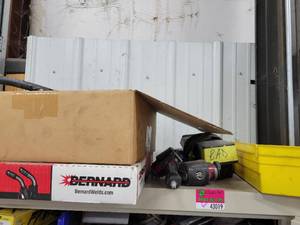 lot 43019 image: Contents Of Shelf W Mini Air Impact Wrench, Cables, and More