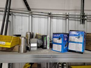 lot 43029 image: Contents Of Shelf W Trailer Winches, Straps, and More