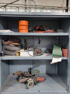 lot 43045 image: Contents Of Cabinet W Sander, Grinder, and More