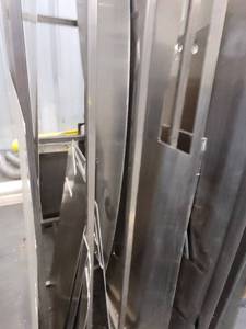 lot 47504 image: Metal Rack W Assorted Aluminum Sheets