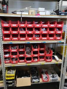 lot 43097 image: Lot Of 4 Shelves, Including Swivel Couplers, Hoses And More