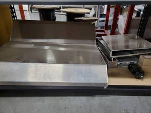lot 43102 image: Contents Of Shelf, Including Aluminum Fabricated Hood And More