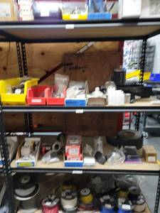 lot 43105 image: Contents Of Entire Shelf, Including Fuel Filter Kits And More