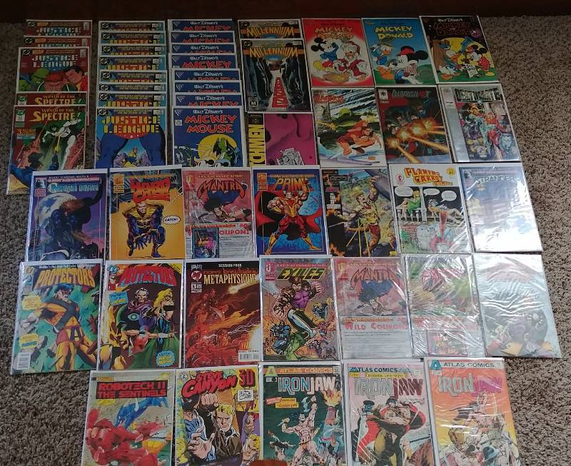 lot 331 image: HUGE 50 Comic Lot Resellers Dream  Mickey Mouse, Justice League, Robotech, Watchmen, MORE.