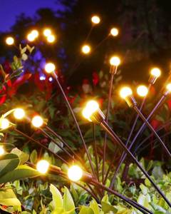 lot 14126 image: Otdair Solar Garden Lights-New Upgraded 4 Pack 8 LED Solar Powered Firefly Lights 4 Pack Solar Firefly Lights Outdoor Waterproof Vibrant Garden Lights for Patio Pathway Decoration, Warm