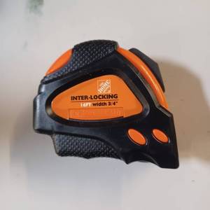 lot 69 image: New Interlocking tape measure