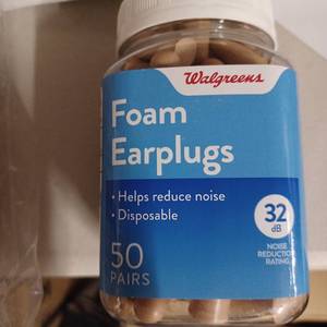 lot 108 image: Bottle of 50 pairs ear plugs great for car races etc