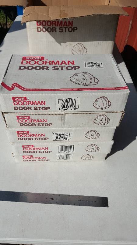 lot 471 image: 30 Ryobi Doorman Door Stops (5 boxes pack 6 sets per box)