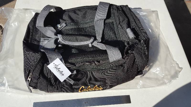 lot 484 image: Cabelas Black Duffel Bag