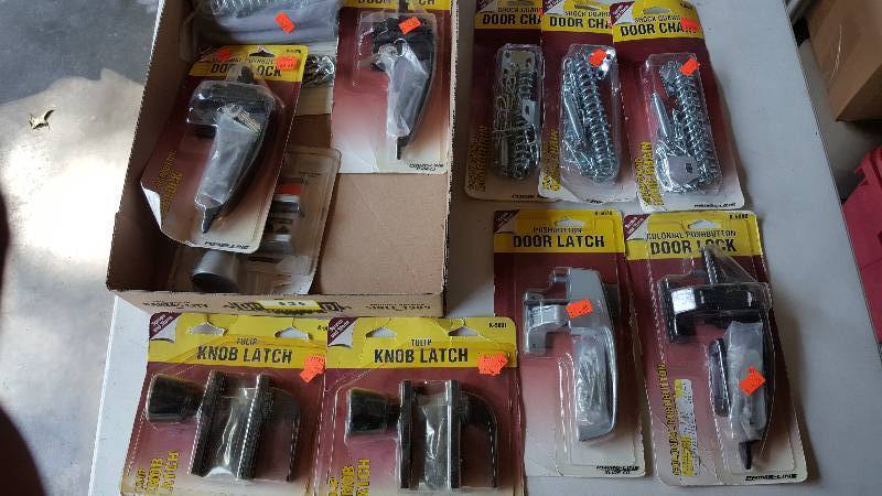 lot 535 image: Lot of Storm Door Handles, Chains, Knobs, and Locks