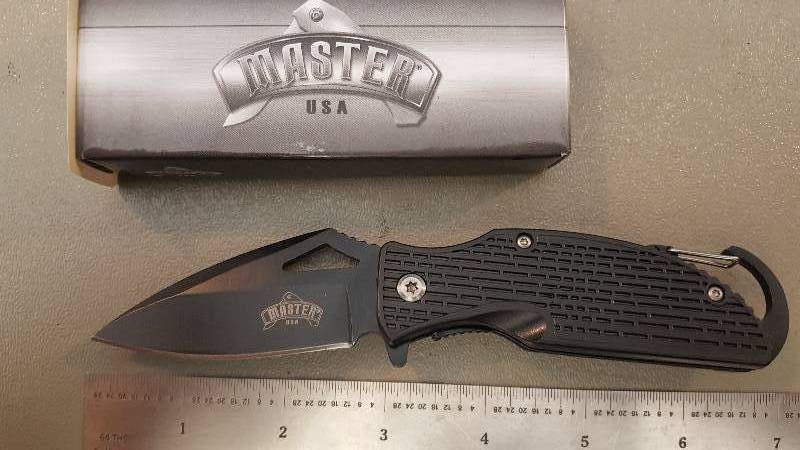 lot 447 image: Spring Assist Knife with Belt Clip, Carabiner, and Fire Striker