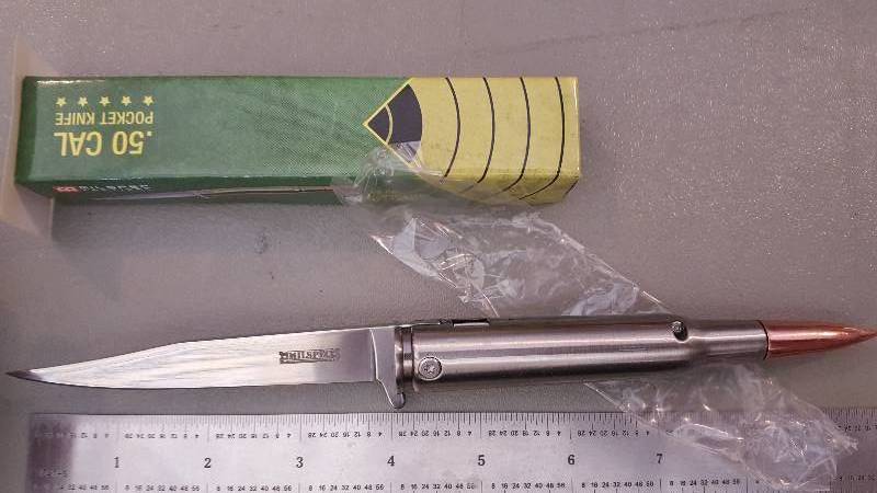 lot 448 image: Spring Assist 50 Caliber Bullet Knife