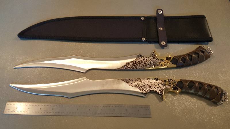 lot 591 image: Twin Swords With Scabbard