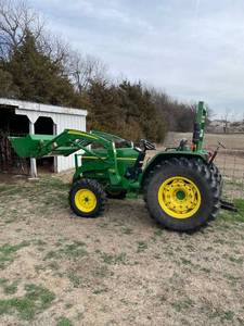 lot 1000 image: 2010 John Deere 4005 tractor with 300CX loader and fork lift attachments with only 205 hours Started up-runs good