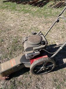 lot 1009 image: Swisher trim-n-mow