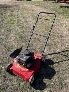 lot 1010 image: Briggs and Stratton push lawn mower