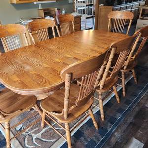 lot 2000 image: Oak farmhouse double pedestal dining table 78 x 42 x 30 in includes leaf with 8 chairs (minor scratches on few chairs)