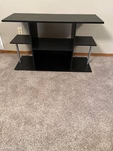 lot 2036 image: TV stand 25 x 42 x 16 Located in the basement
