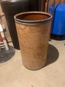 lot 2042 image: Cardboard barrel. 31 x 17. Includes contents. Located in the basement