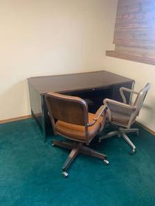 lot 2044 image: 2 Office chairs with metal desk. 29 x 60 x 30. Located in the basement