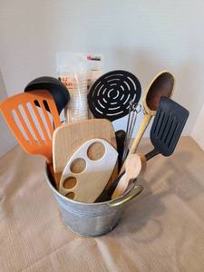 lot 2128 image: Metal bucket with cooking utensils