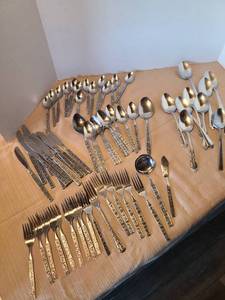 lot 2132 image: Incomplete set stainless flatware plus unmatched serving spoons