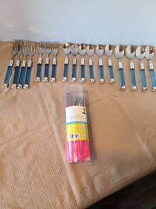 lot 2133 image: Plastic and stainless flatware. Pink set never opened, blue set incomplete