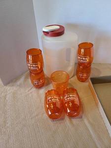 lot 2146 image: Jug and orange plastic drinkware