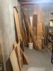 lot 2057 image: Scrap wood. Located in the basement. Winner must take all. Doesnt include the boxes of tile in corner