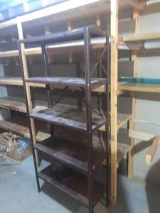 lot 2058 image: Metal shelf. 65 x 31 x 12.5. Located in the basement