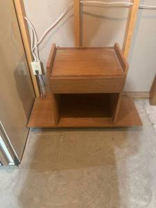 lot 2061 image: Small table tv stand. 25 x 36 x 14. Located in the basement