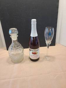 lot 2172 image: Decanter, sparkling apple-pomegranate juice, wine glass