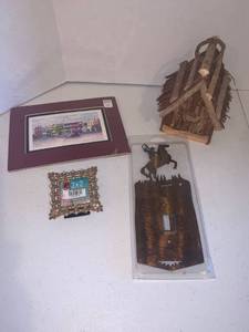 lot 2213 image: Various home decor. Cowboy light switch cover, bird house, frame, and picture