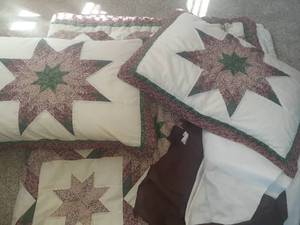 lot 2322 image: Queen sized bedding. Comforter, pillows with shams and bed skirt