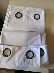 lot 2405 image: Two white blackout curtain panels grommet style 36 x 84