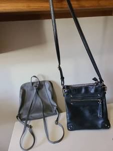 lot 2410 image: Grey backpack style and black crossbody purses